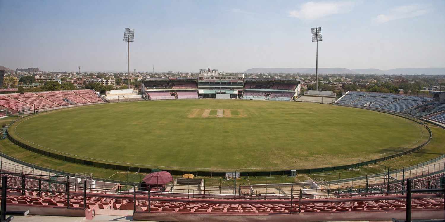 Sawai Mansingh Stadium panoramic view showing the cricket field, stands, and central pitch.